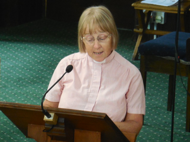 Rev Margaret Collins delivering the sermon