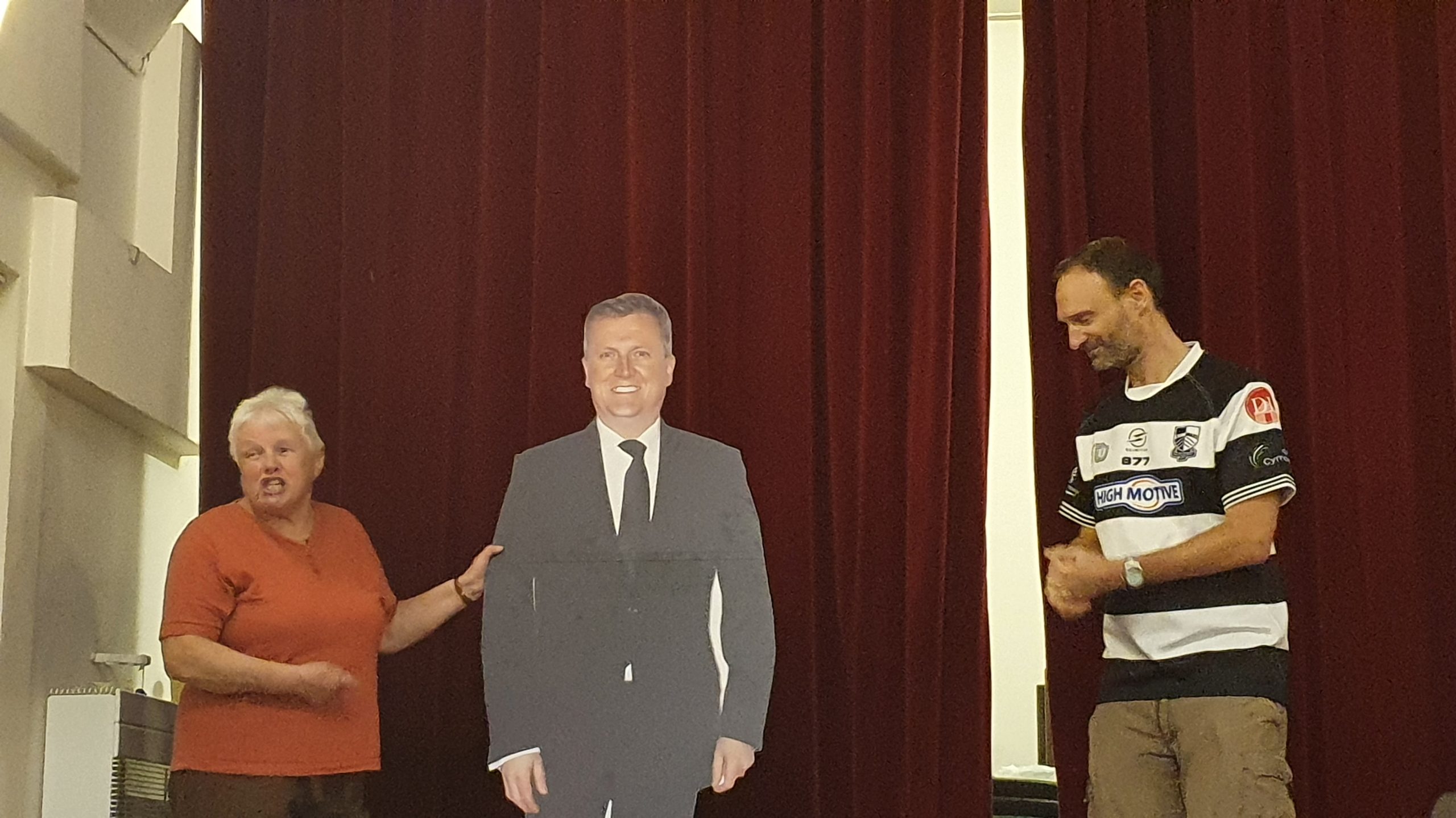 Image of two people standing next to a full size cardboard cutout of the radio presenter and singer, Aled Jones